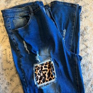 Plus size womens leopard distressed jeans